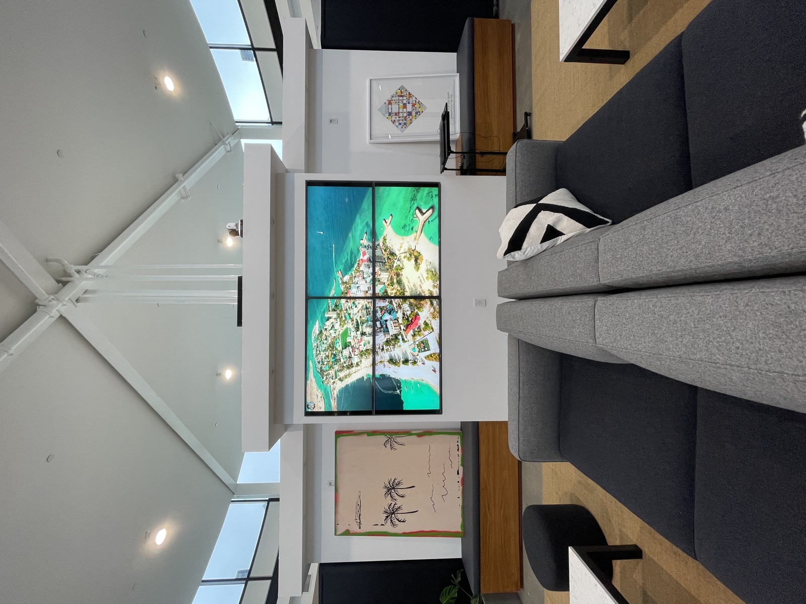 Lounge seating facing the office video wall