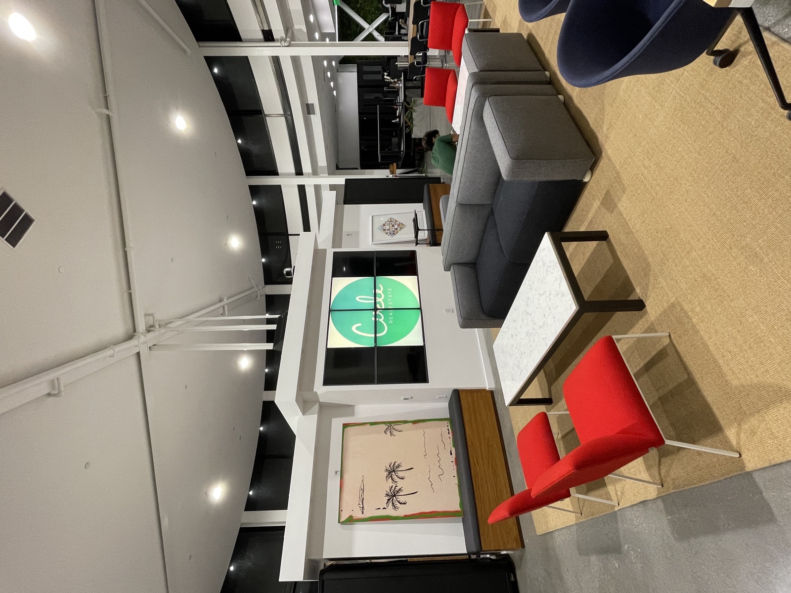 Circle branded lounge wall with seating area